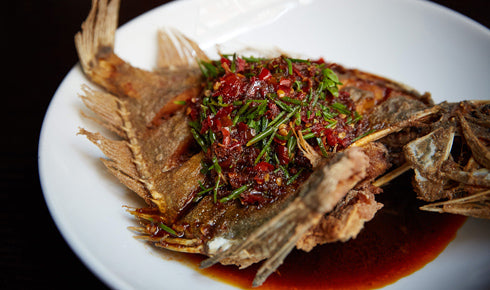 DEEP-FRIED WHOLE JOHN DORY WITH CHILLI SAUCE AND NATIVE HERBS